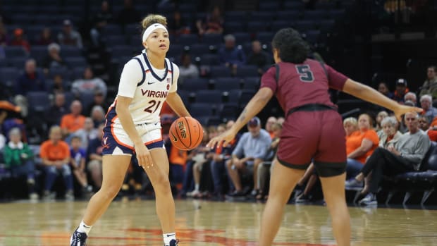 Kymora Johnson handles the ball during the Virginia women's basketball game against Maryland Eastern Shore at John Paul Jones Arena.